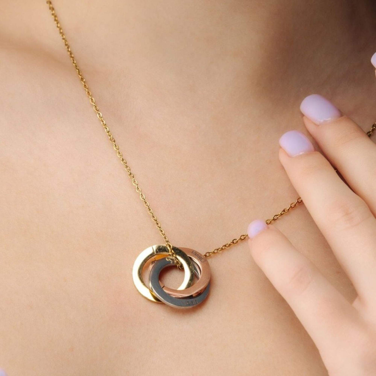 Triple Name Necklace by Brother & Sisters, showcasing personalized charm and timeless elegance on a model.