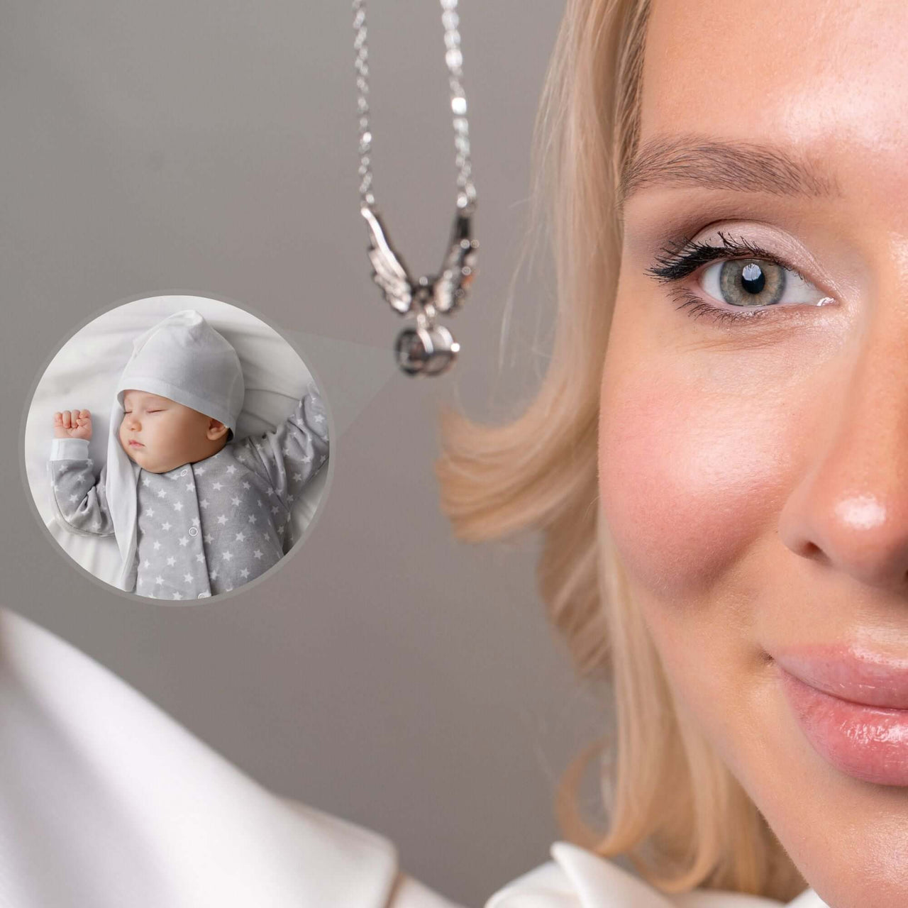 Wings Photo Necklace by Brother & Sisters featuring personalized photo of a sleeping baby in angel wings.