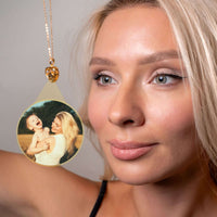 Thumbnail for Woman modeling a Winter Photo Necklace featuring a cherished family photo by Brother & Sisters.